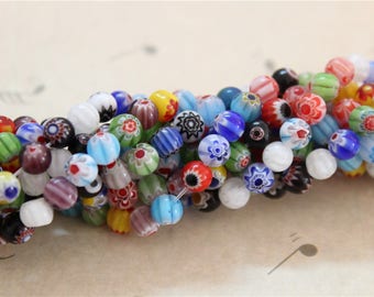 a string of 65 pcs beads millefiori glass round 6mm