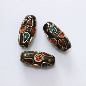 2 pcs bead Indonesian Nepalese ethnic hand made oval brown