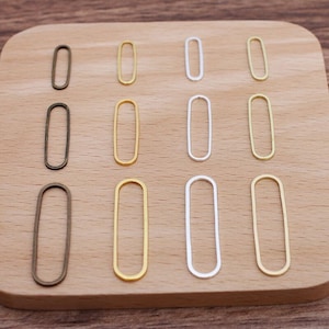 Bulk 200 pcs connector ring rectangle-oval  brass base