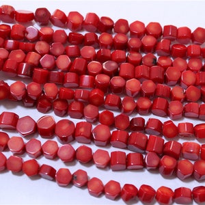 a string of beads red coral hexagon  shape  top quality