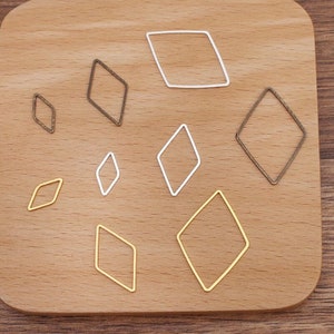 Bulk 100pcs jump ring lozenge connector metal brass base