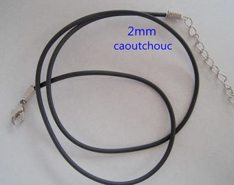May include: A black 2mm rubber necklace with a silver spring clasp and a silver chain extension.