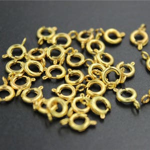 50 pcs clasp round  metal gold tone brass base 6mmX9mm