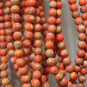 a strand of beads jasper Aqua Terra orange round 8mm