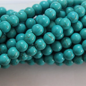 a string of 54 pcs beads turquoise round 8mm