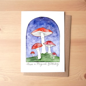 Tenha um cartão comemorativo ilustrado em aquarela de aniversário mágico + envelope