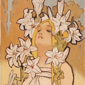 May include: An Art Nouveau painting depicting a woman with blonde hair, crowned with white lilies. She is draped in a flowing white gown, set against a yellow and tan backdrop. The artwork has a classical aesthetic.