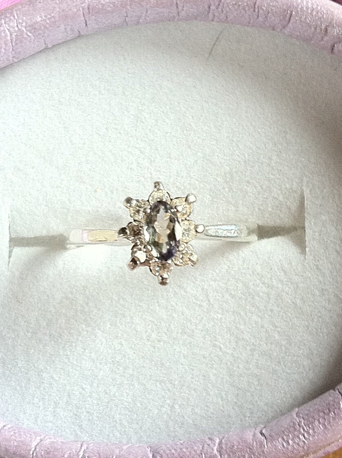 Natural Ocean Tanzanite Diamond accented Platinum Wrapped Engagement Ring
