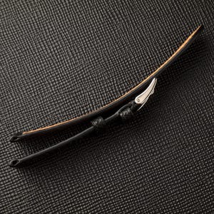 May include: Black leather watch strap with a silver buckle.