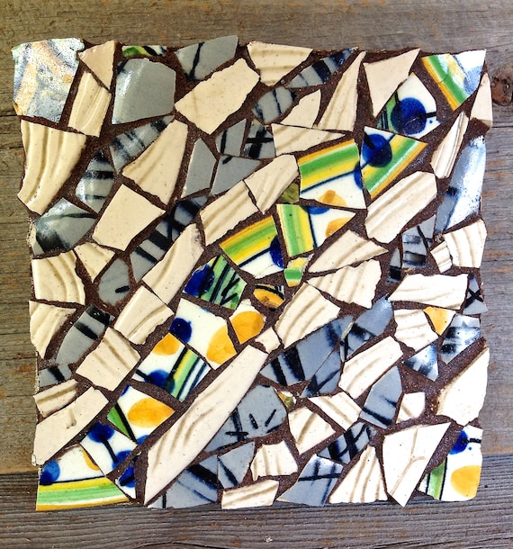 Items similar to mosaic trivet with handmade stoneware shards on Etsy