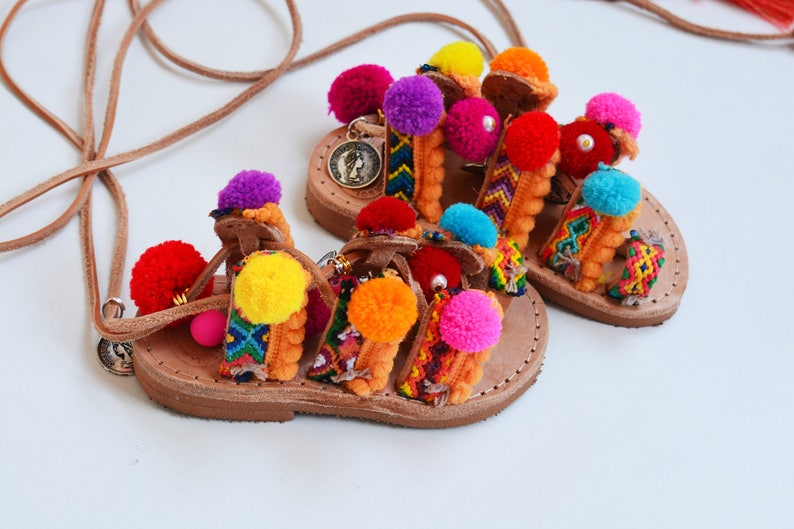 tie up sandals with pom poms