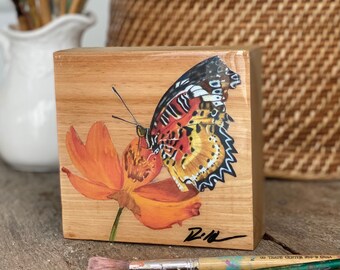 Butterfly art print on reclaimed cypress wood w/ resin top coat. Red and yellow butterfly art on wood. Modern farmhouse shelf decor.