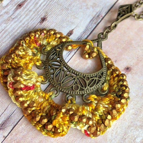 Golden Waves of Sun Boho Pendant Necklace - Hand Crochet - Brass Chain and Filigree Metal Focal - Hand Dyed Fiber - Glass Beads- OOAK