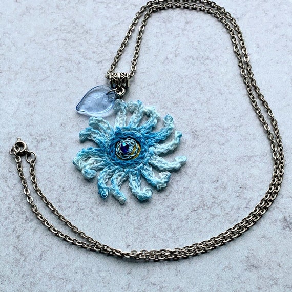 Sky Blue Mixed Media Flower Pendant - Crochet Linen Petals - Hand Painted - Embroidered Center - Glass Leaf - 24 inch Chain - One of a Kind