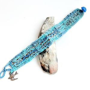 Hand Embroidered Crochet Over Metal Bracelet: Sky Blue Thread, Silver Bird Charm