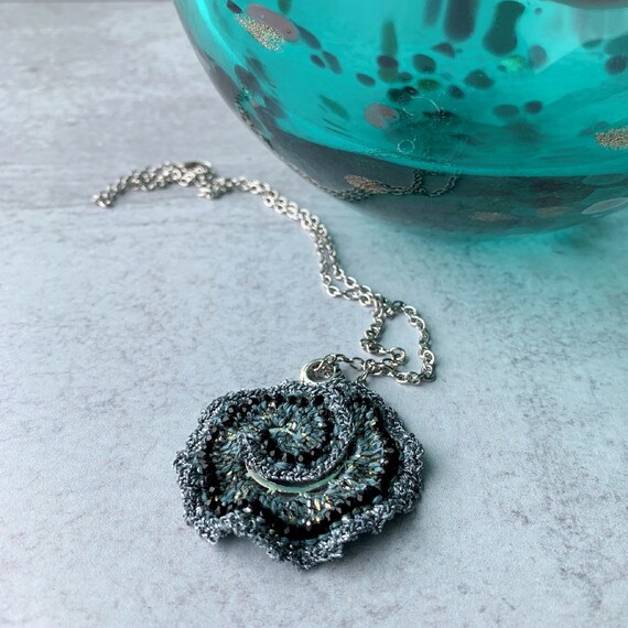 Ruffled Spiral Swirl Pendant Necklace - Mixed Media - Metal Fiber Glass - Pale Sage Green, Silver, Black, Metallics - Crochet - OOAK