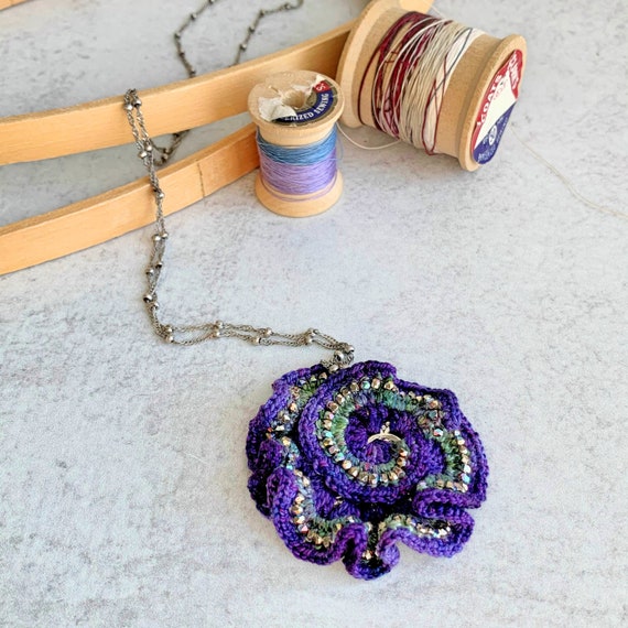 Ruffled Spiral Swirl Pendant Necklace - Mixed Media - Metal Fiber Glass - Purple, Green, Silver, Iridescent Metallic Beads - Crochet