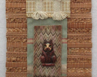 Fabric,fiber art decor,fabric collage,brown,cream and beige, redirected materials,small fiber wall hanging,Mexican,Native Amer inspired,dog