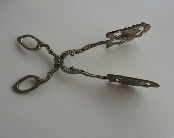 Brass tongs,Italian ornate unusual tongs,usable,8" x 2",unique East Indian monkey faces,marked Italy,all surfaced are decorated,OOAK