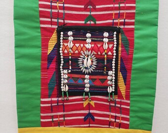 Fabric Wall Hanging, multicultural wall art,repurposed found purse sewn on an antique huipil(top) framed with lime green and yellow fabric.