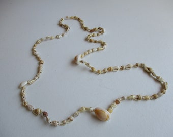 Vintage shell necklace,mostly single small shells,front 3 cowry shells, white with beige or coral undertones,36"(91cm),Hawaiian party wear