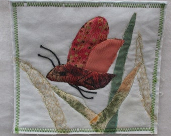 Dragonfly nature wall art quilt, small handmade wall hanging,peach colored wings in a wetlands landscape, fabric art quilt, insect art