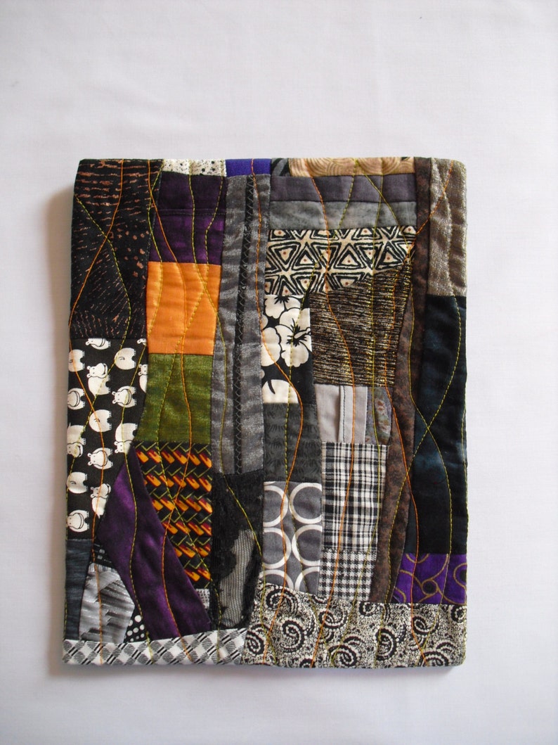 Abstract,wall art,Fiber Art Wall Hanging,fabric collage, black and white fabrics,contrast with orange and purples,inspired by Gees Bend 