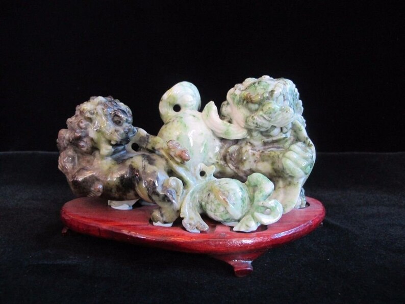 jade foo dog statues