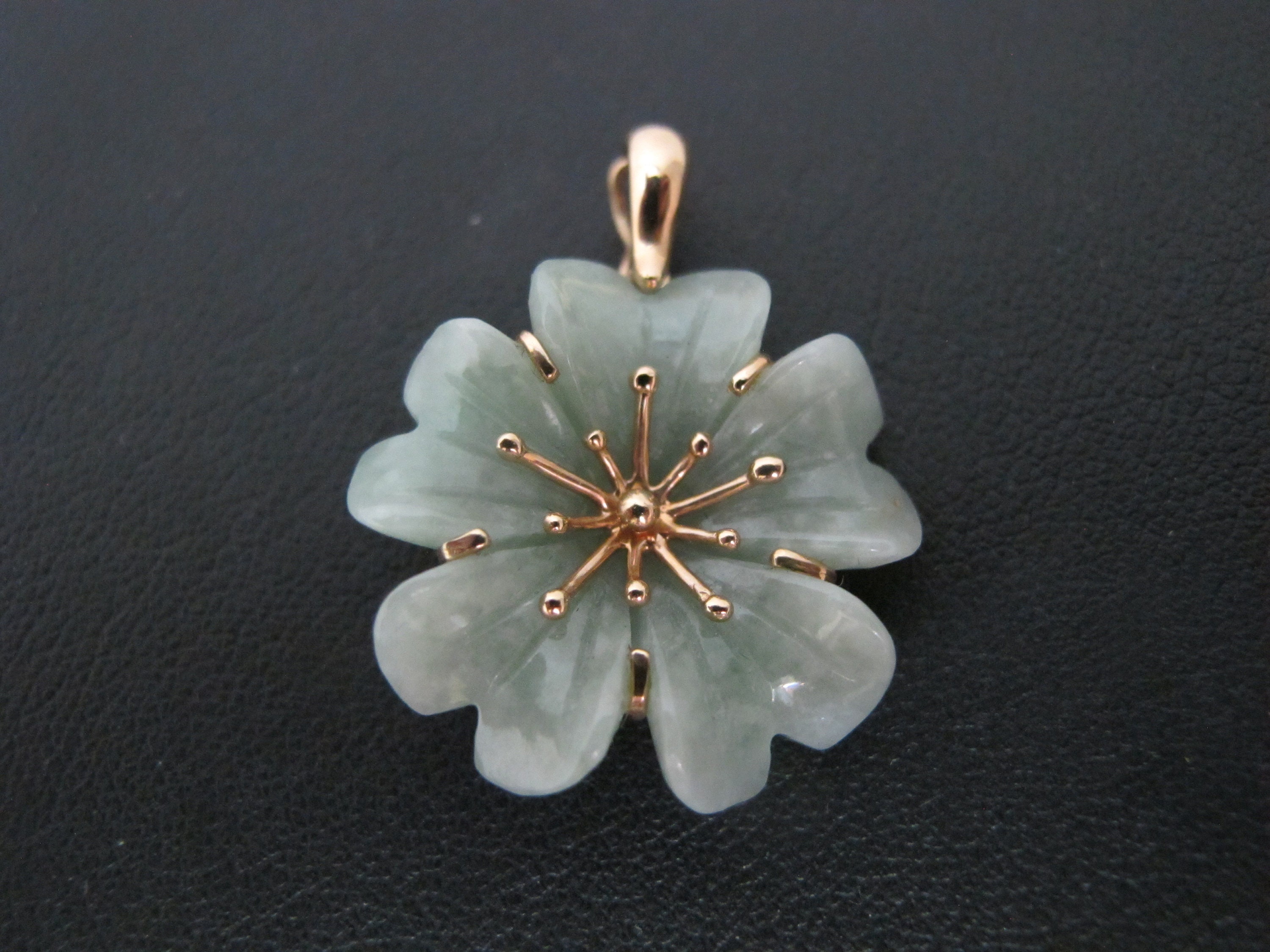 Jade flower pendant deals