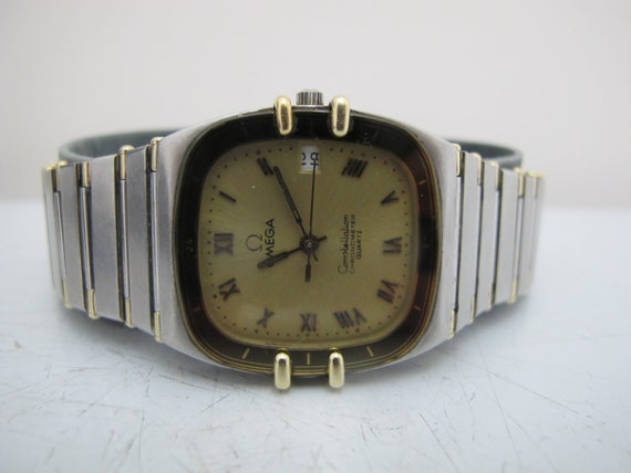 Omega silver and gold watch best sale