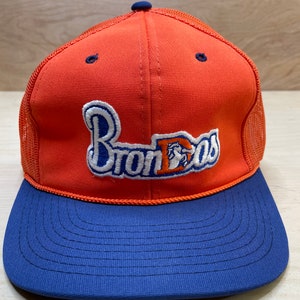 May include: Orange and blue trucker hat with a white embroidered logo that says "Broncos".