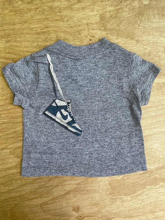 Nike hanging shoes t shirt hotsell