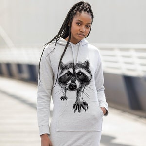 Light grey women hoodie dress with raccoon print in black and white.