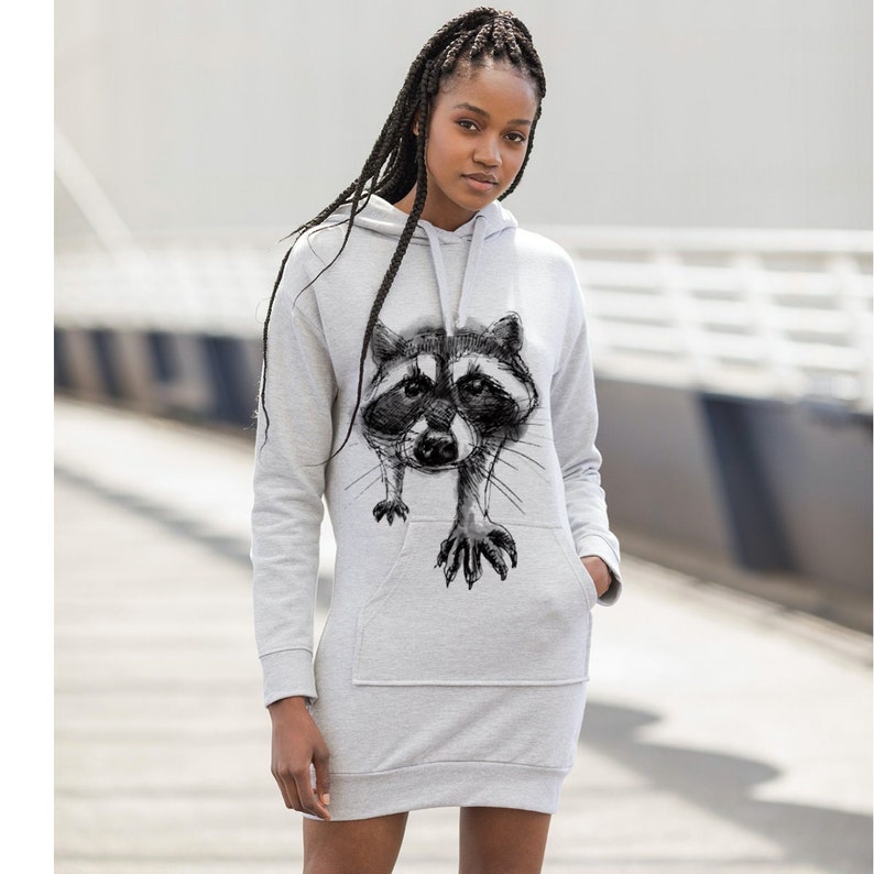 Light grey women hoodie dress with raccoon print in black and white.