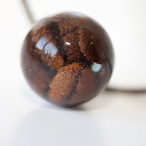Coffee bean necklace with long chain and resin pendant