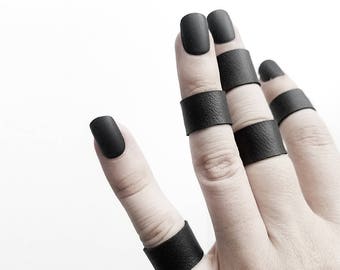 END Of The WORLD shiny silver stretch vegan leather ring