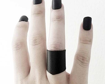 END Of The WORLD shiny silver stretch vegan leather ring
