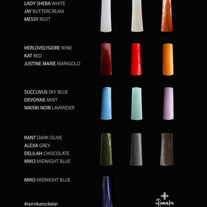 May include: A chart of nail polish colors with names for each color. The colors include white, cream, rust, red, wine, marigold, sky blue, mint, lavender, dark olive, gray, chocolate, and midnight blue.