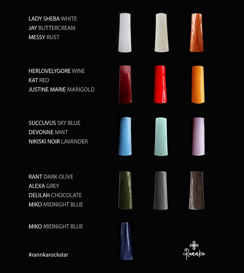 May include: A chart of nail polish colors with names for each color. The colors include white, cream, rust, red, wine, marigold, sky blue, mint, lavender, dark olive, gray, chocolate, and midnight blue.