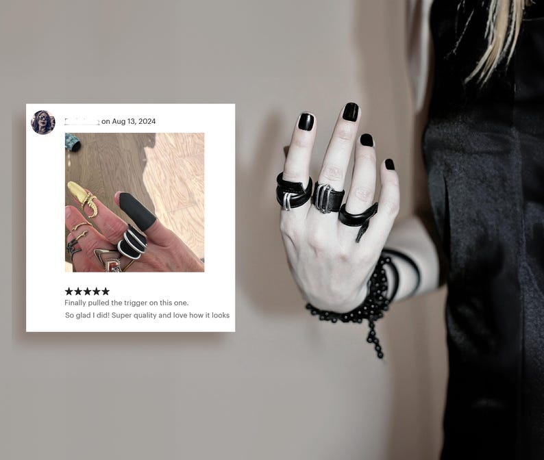 dramatic finger cuff with metal hoops makes a unique jewelry gift idea for individuals who value innovation and creativity
