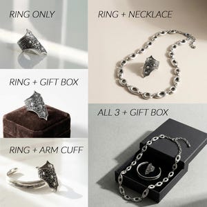 May include: A silver-toned ring with an ornate design is displayed in multiple arrangements. The image shows the ring alone, with a necklace, in a gift box, with an arm cuff, and with all three items in a gift box. Text in the image reads: RING ONLY, RING + NECKLACE, RING + GIFT BOX, RING + ARM CUFF, ALL 3 + GIFT BOX.