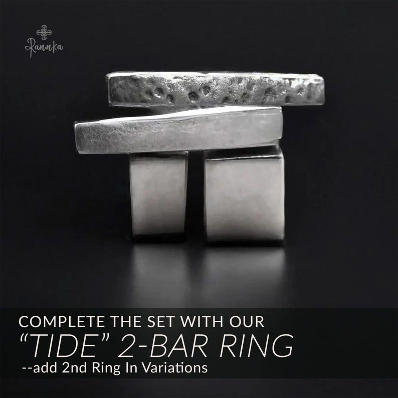 May include: A silver-toned ring with a unique design, featuring two rectangular bars and two square supports. The top bar has a textured surface. The text on the image reads "COMPLETE THE SET WITH OUR 'TIDE' 2-BAR RING".