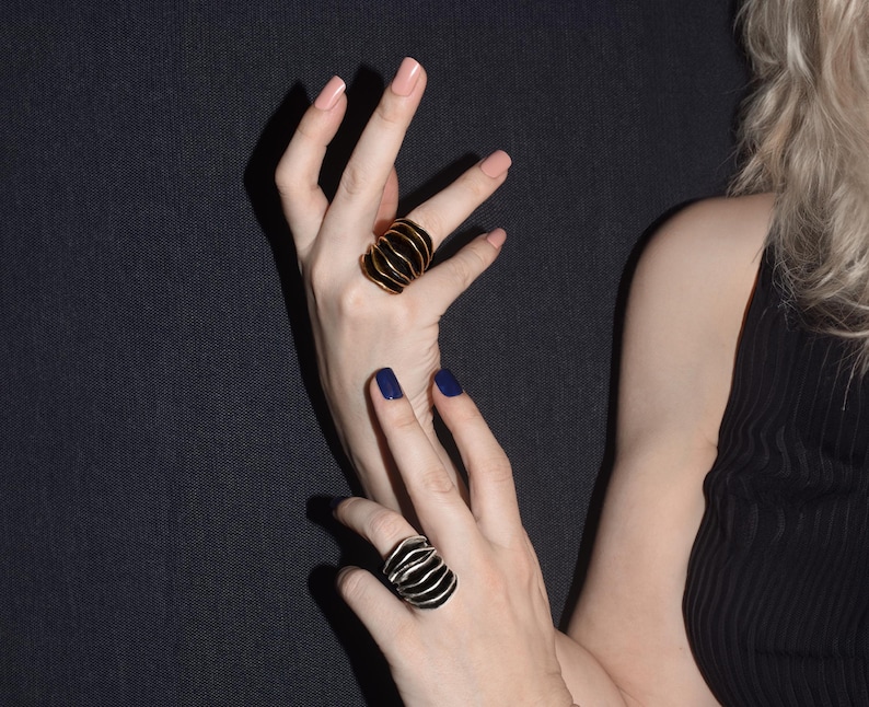 large statement ring is available in gold or silver, making it a perfect holiday gift or date night idea