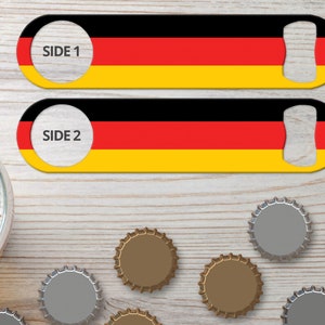 May include: Two black, red, and yellow bottle openers with the German flag design. The top opener has the text "SIDE 1" and the bottom opener has the text "SIDE 2".