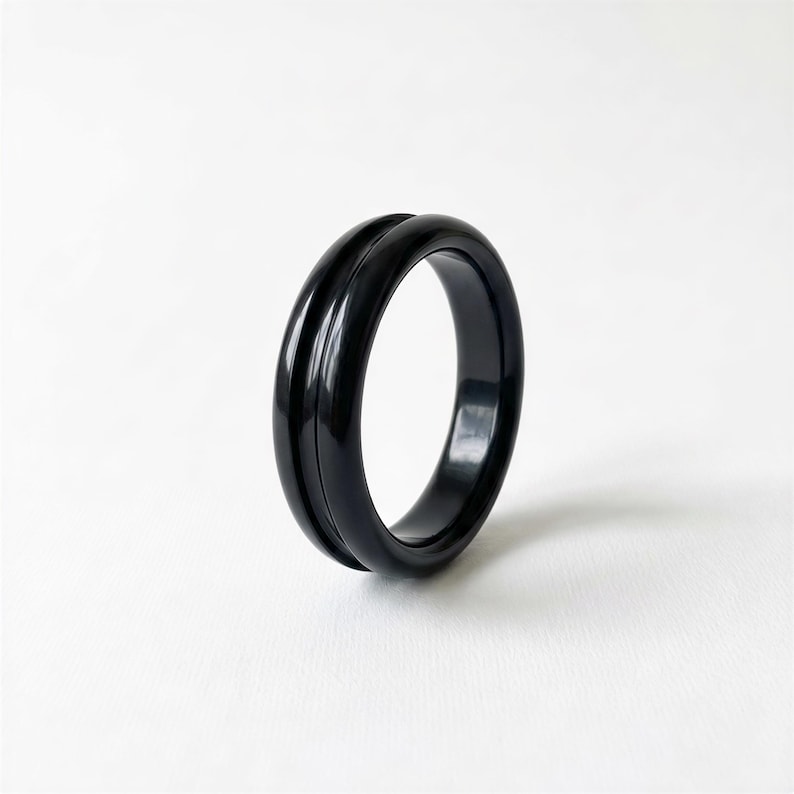 Black rubber spinner ring for bartender bottle openers