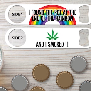 May include: White metal bottle opener with a rainbow and the text "I found the pot at the end of the rainbow" on one side and a green marijuana leaf and the text "And I smoked it" on the other side.