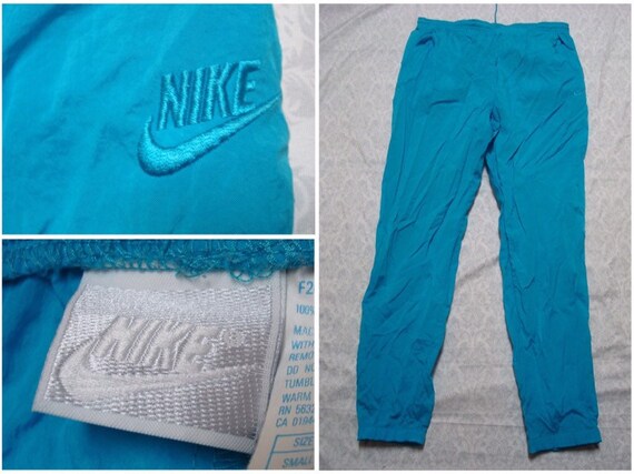 pantalones nike plata
