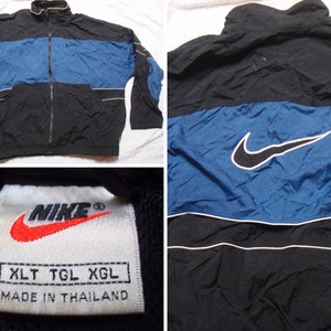 blue and black nike windbreaker