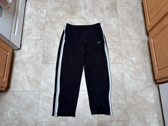 nike track pants white stripe
