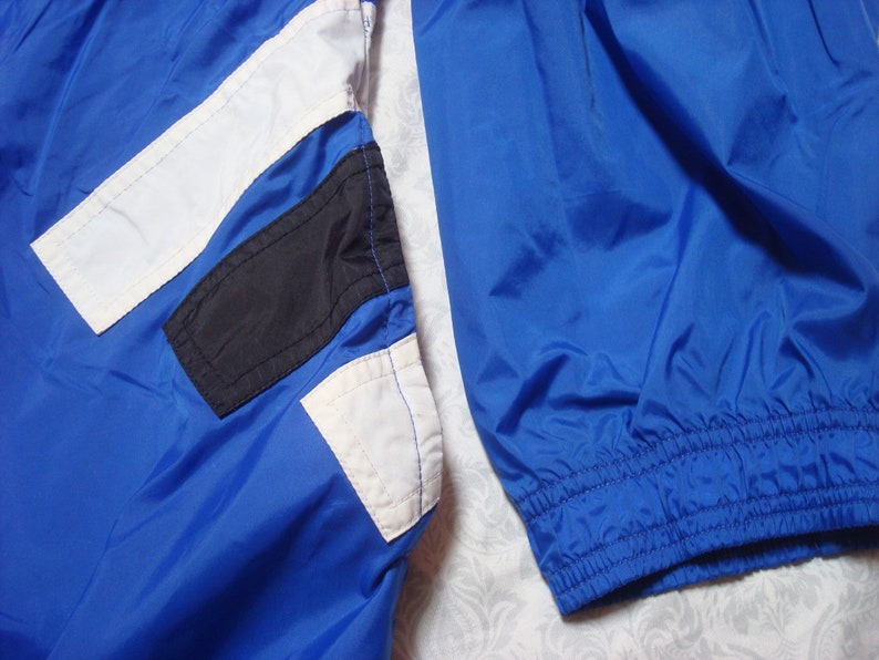 adidas jacke schwarz blauen streifen